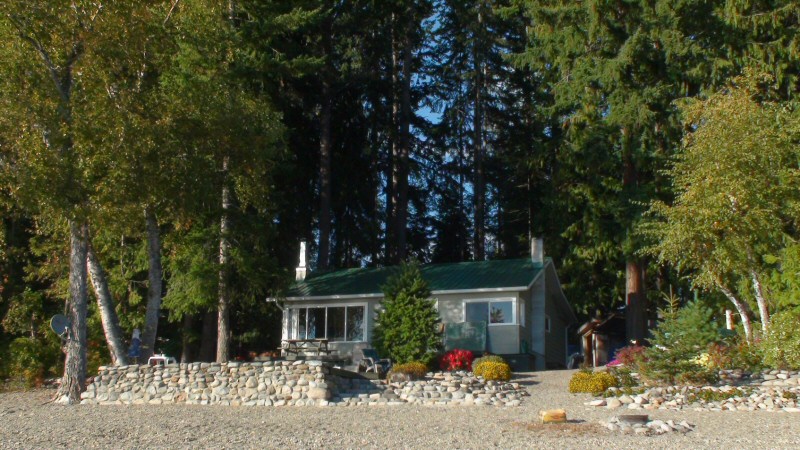cabin and decks from the beach in late summer